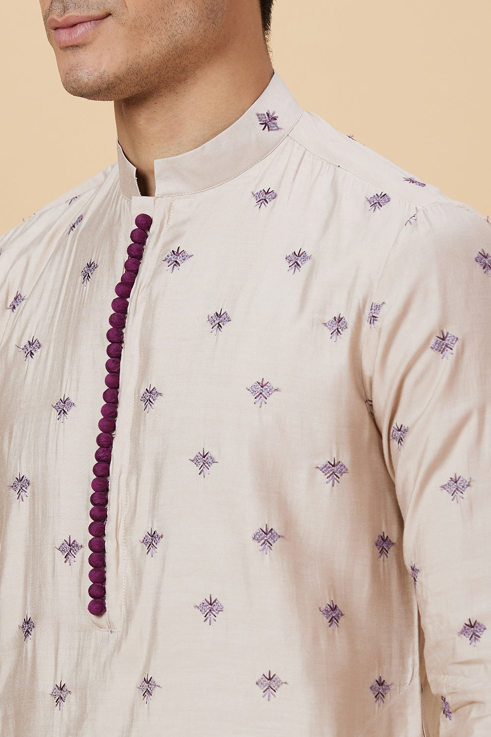 Kurta with small flower embroidery with polti button details