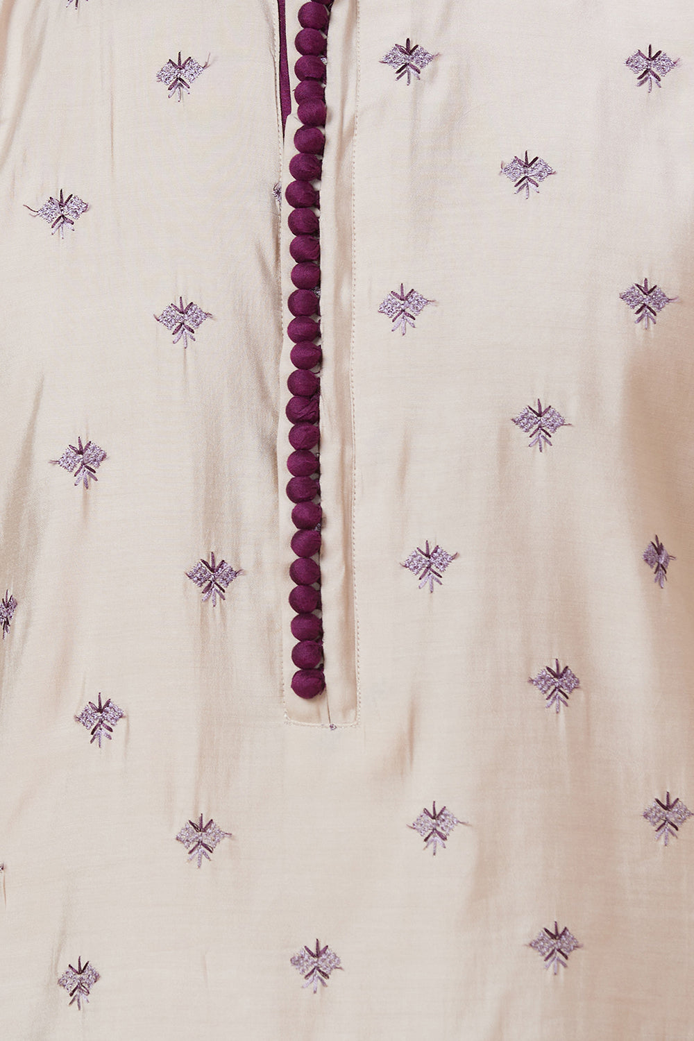 Kurta with small flower embroidery with polti button details