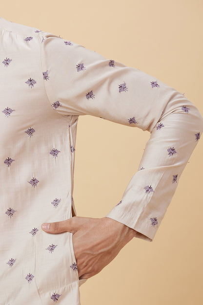 Kurta with small flower embroidery with polti button details