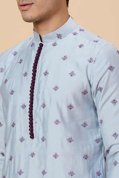 Kurta with small flower embroidery with polti button details